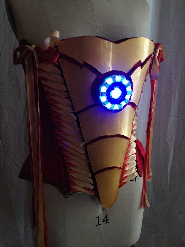 Iron Man corset with arc reactor turned on. Image copyright: Nikki Cohen, MayFaire Moon Red and gold corset based on Iron Man costume, with lit up 3D printed arc reactor